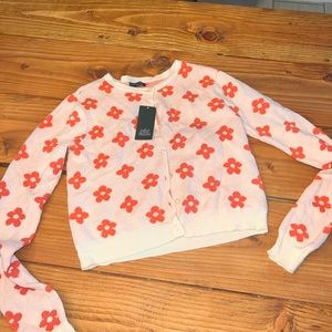 Cárdigan with orange flowers